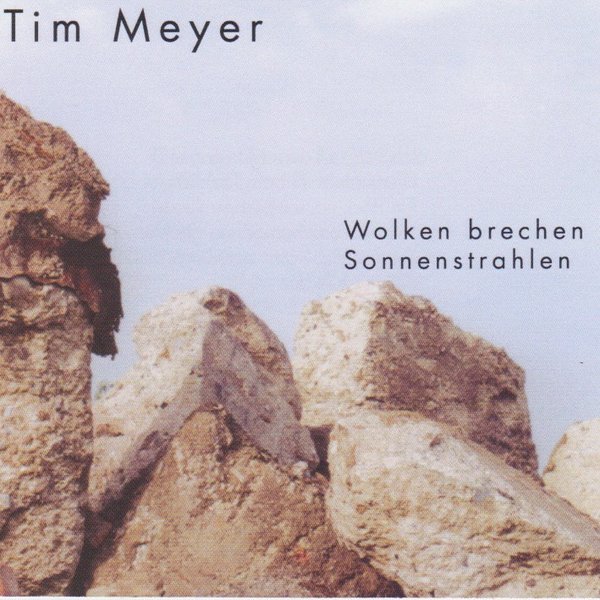 Wolken brechen Sonnenstrahlen